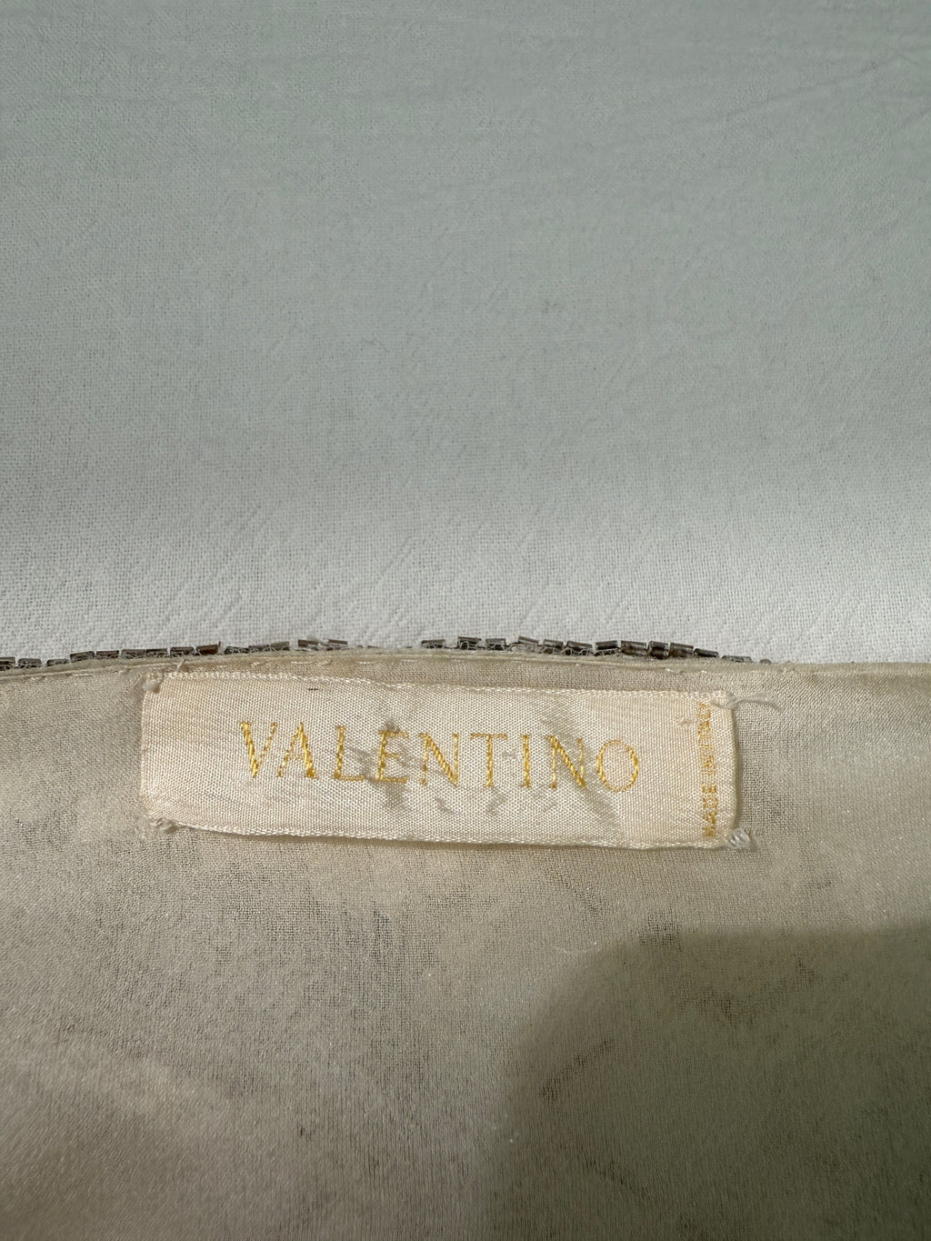 Valentino FW2003 ivory beaded floral bodice tiered silk chiffon gown tag. bridal, wedding, reception look