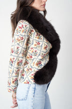Christian Dior FW1999 needlepoint jacket — side view showing cinched waist and fur sweep close up