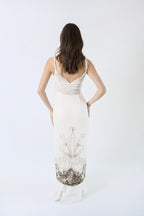 Dior by John Galliano FW2009 ivory silk chiffon gown — back view on model
