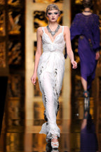 Dior by Galliano FW 2009 Ivory gown with filigree and hand embellishment. Runway closing look