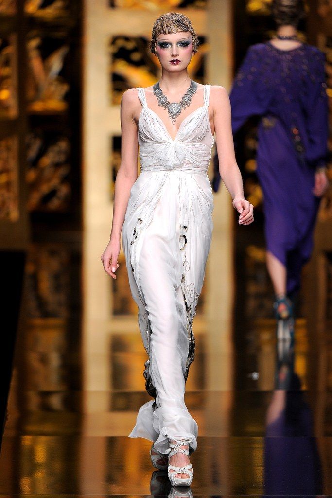 Dior by Galliano FW 2009 Ivory gown with filigree and hand embellishment. Runway closing look