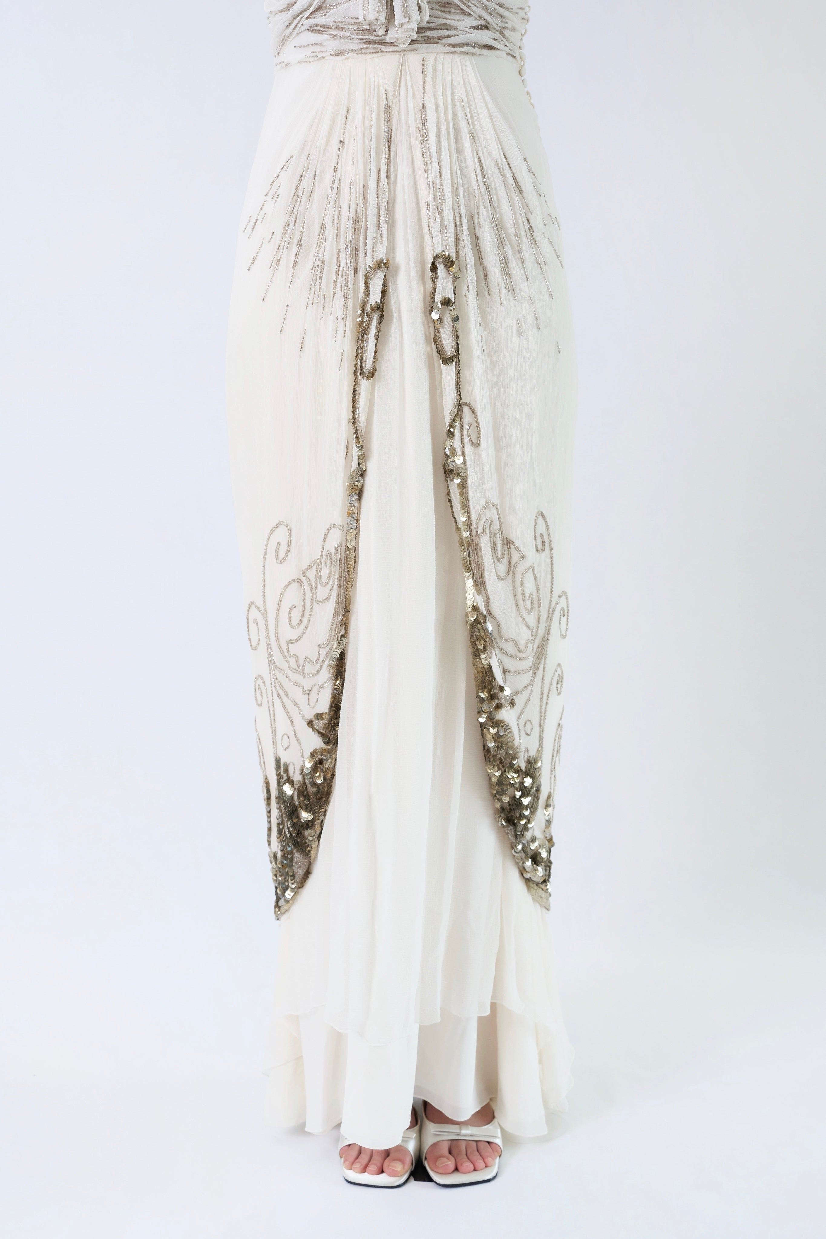 Dior by John Galliano FW2009 — curved overlay panels with antique silver sequin filigree detail