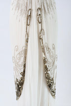 Dior by John Galliano FW2009 — silver filigree scrollwork overlay panels and sequin hem detail