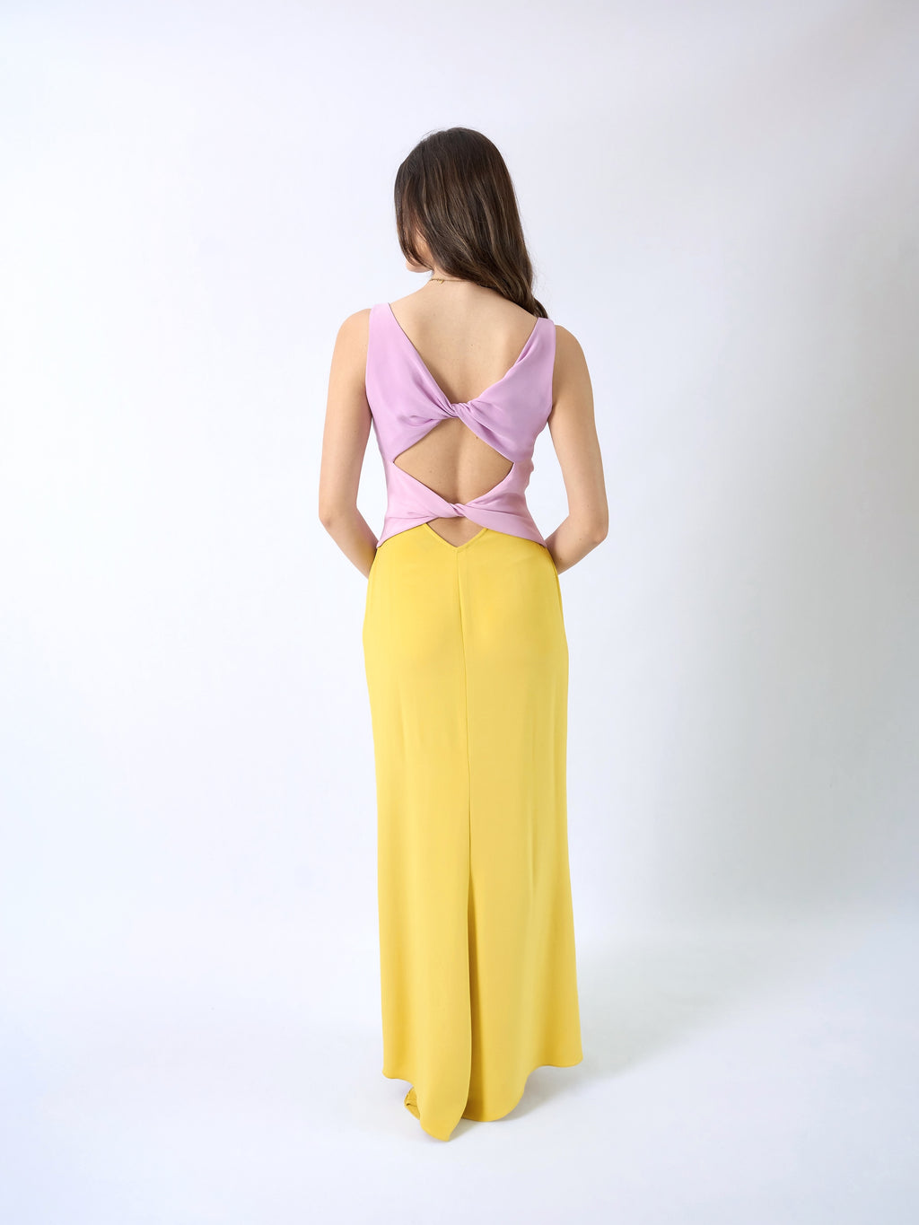 Valentino SS1998 — full back view showing deep open back with twisted fabric bands and V-waist cutout